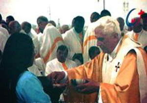 Benedict-Ratzinger Handing out the Cookie